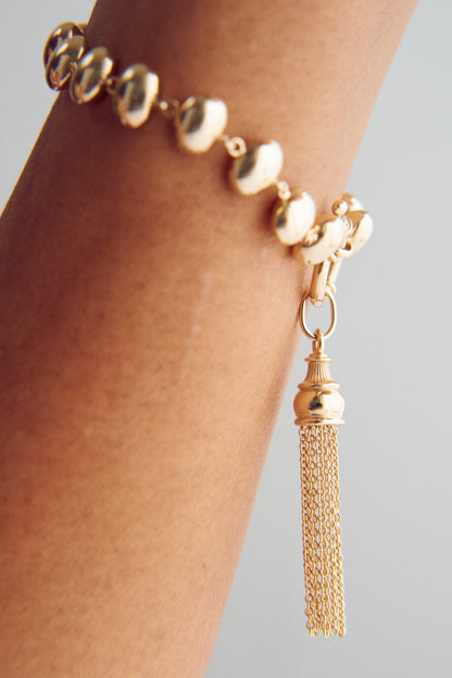 GOLDEN TASSEL CHARM