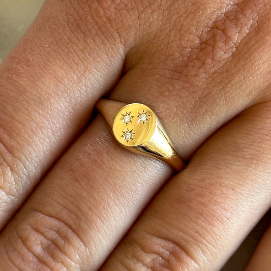 SAMPLE YELLOW GOLD THREE STAR SIGNET RING